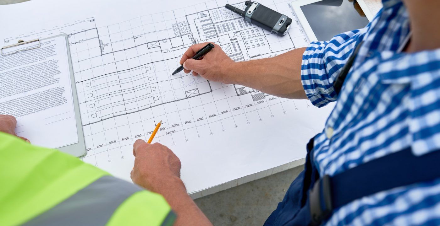 Builders Looking at Floor Plans